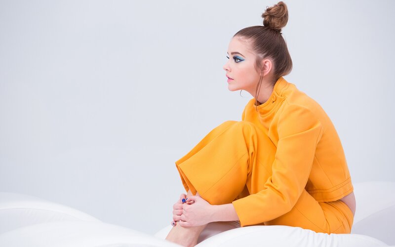 woman in yellow outfit
