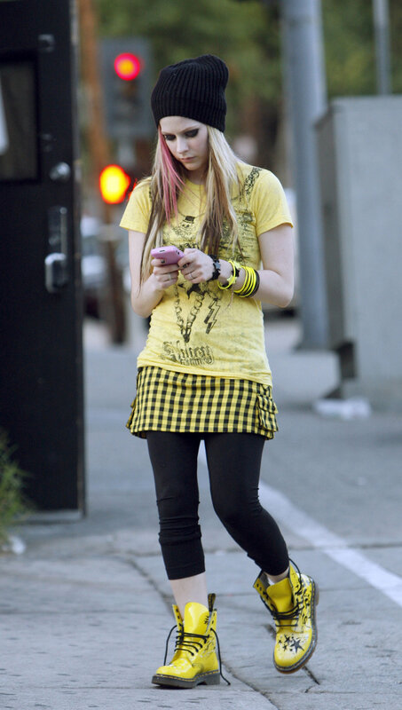 woman in yellow outfit walking