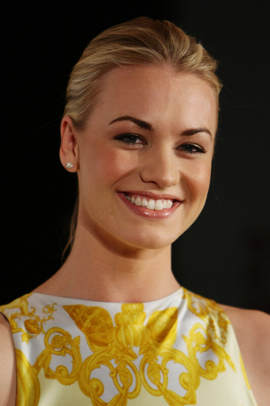 woman in yellow patterned dress