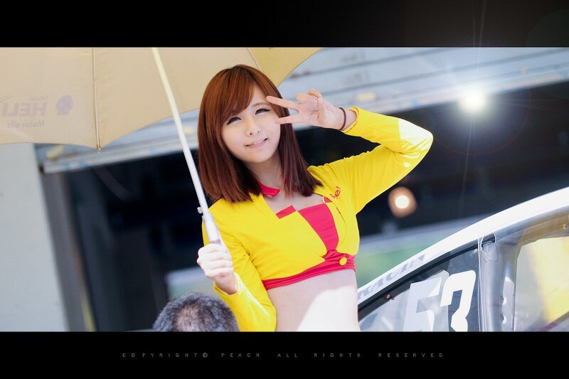 Woman in yellow racing suit