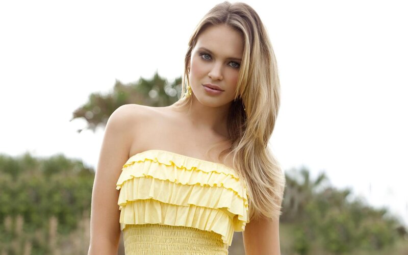 woman in yellow ruffled dress