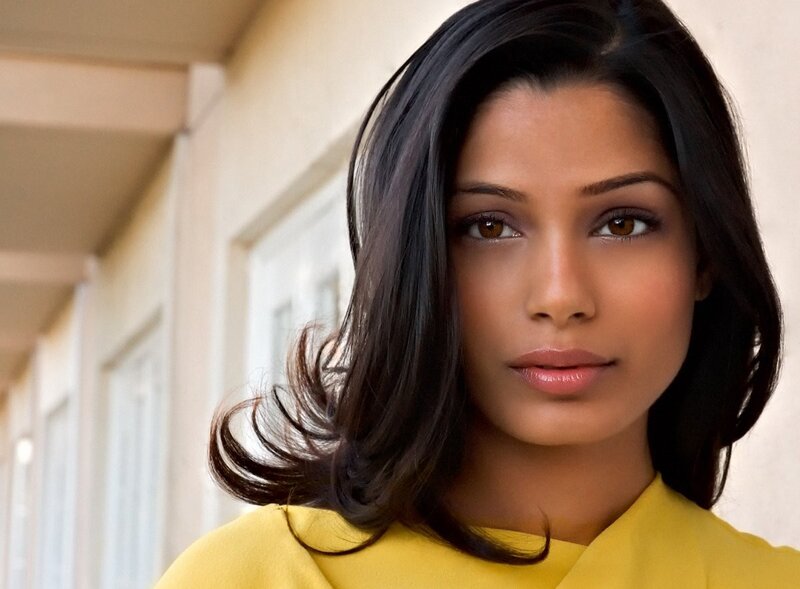 woman in yellow shirt