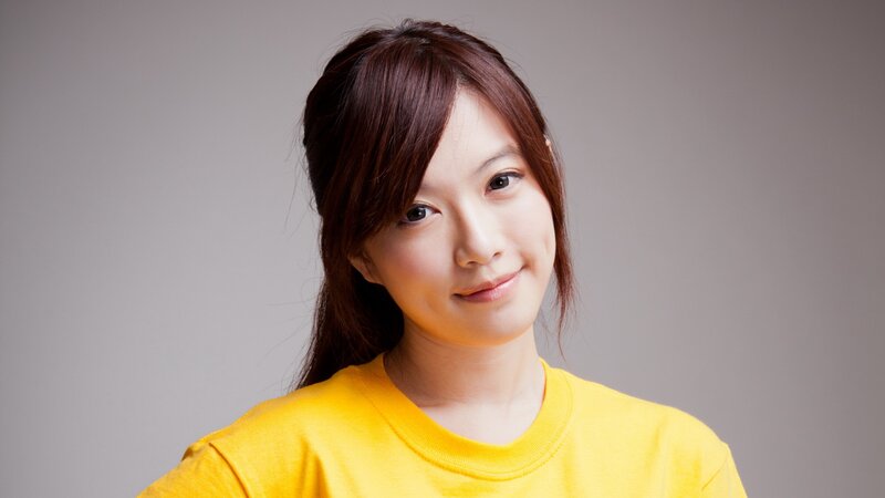 woman in yellow shirt