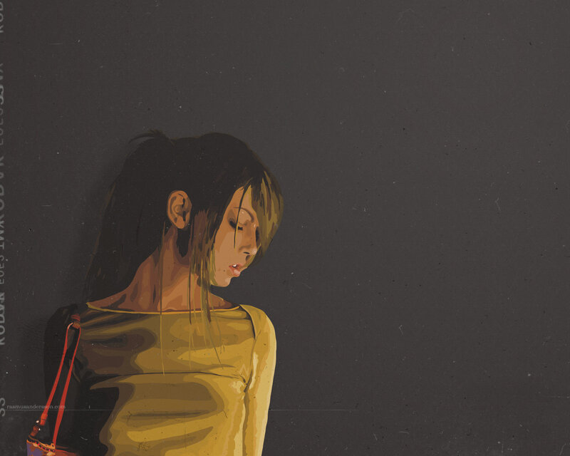 woman in yellow shirt looking down