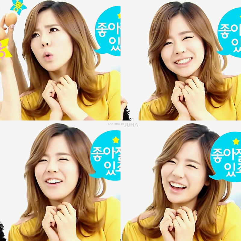 woman in yellow shirt smiling