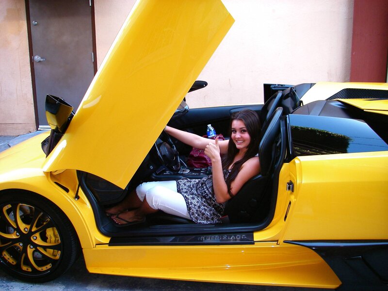 Woman in Yellow Sports Car — Happy