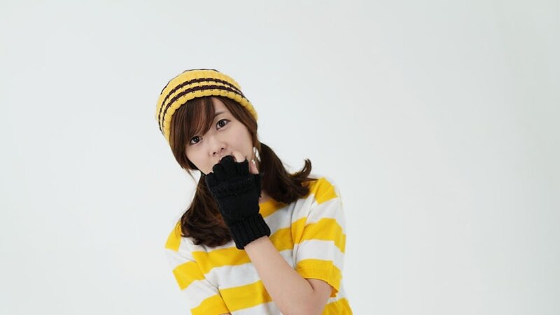 woman in yellow striped outfit