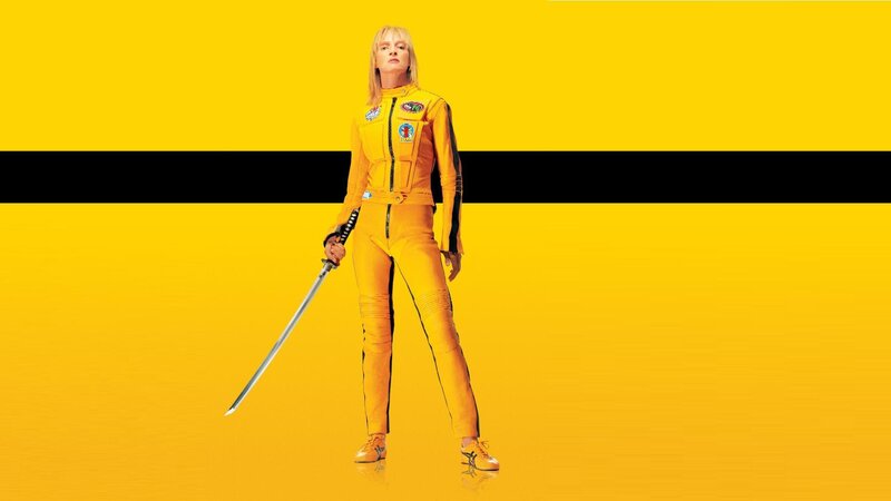 Woman in Yellow Suit — Dramatic, Photograph, Sword