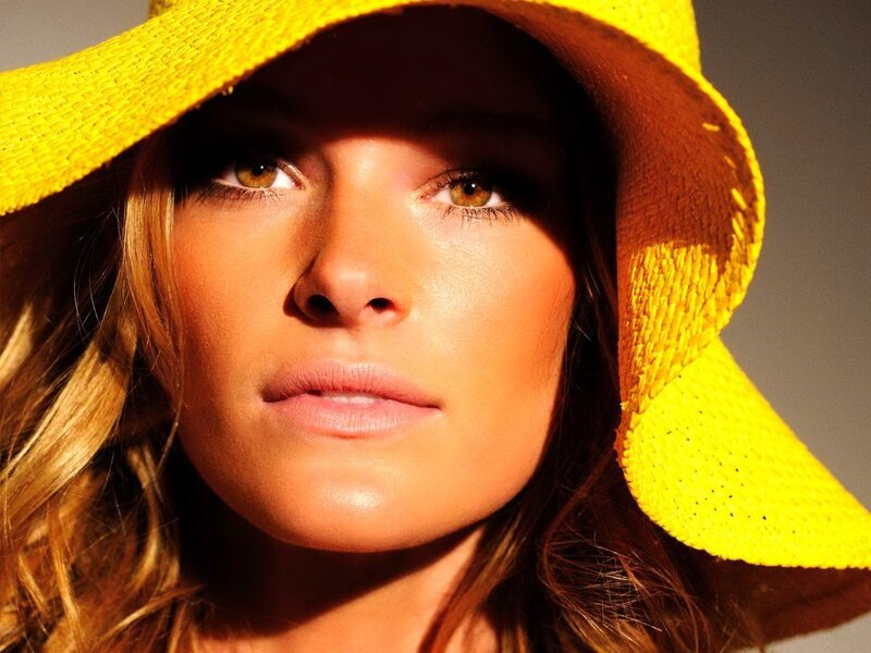 woman in yellow sun hat