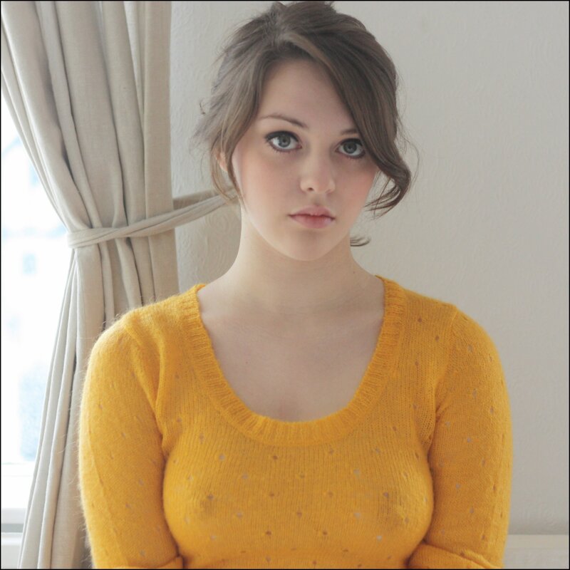 woman in yellow sweater