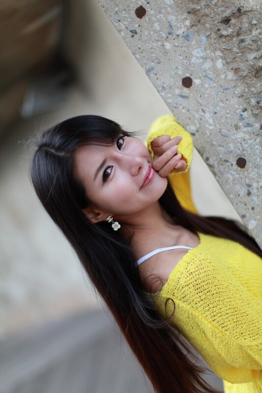 woman in yellow sweater