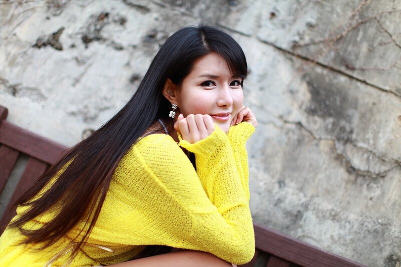 woman in yellow sweater
