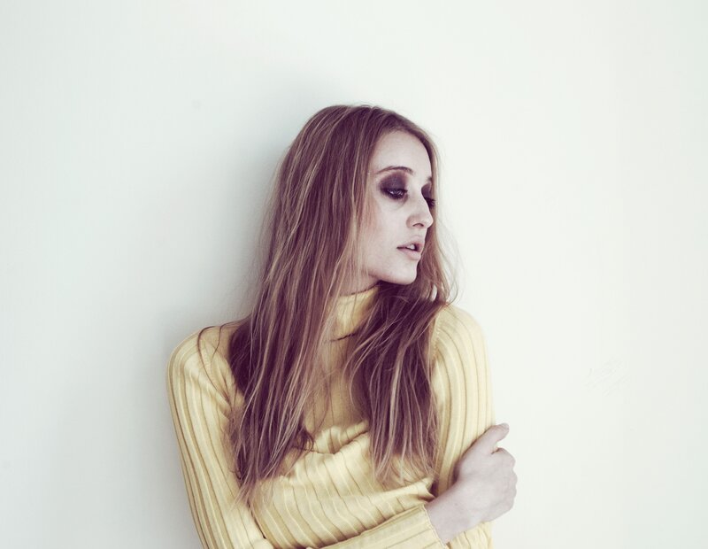 woman in yellow sweater