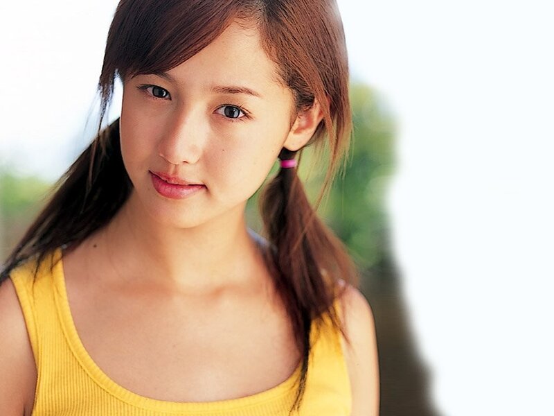 woman in yellow top