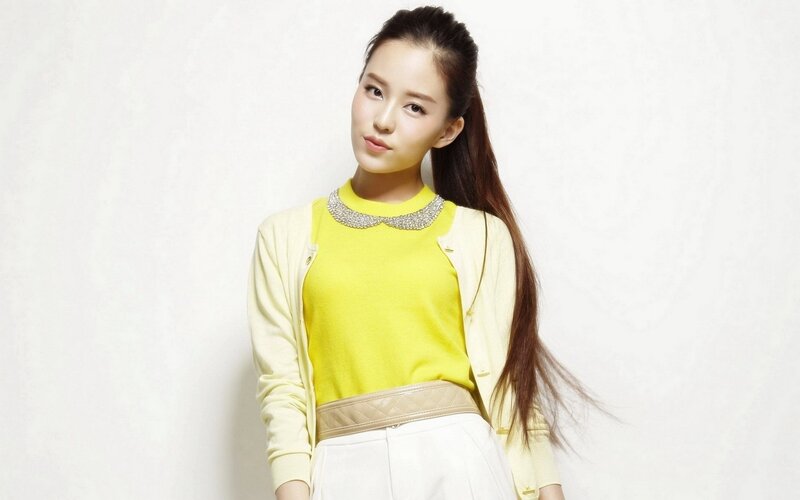 woman in yellow top
