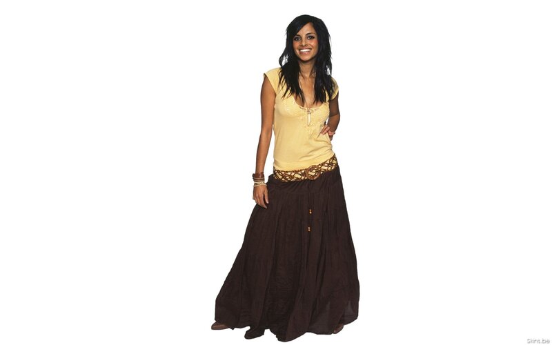 woman in yellow top and brown skirt