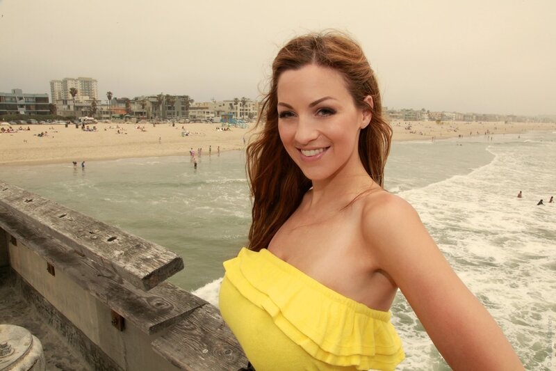 Woman in yellow top at beach