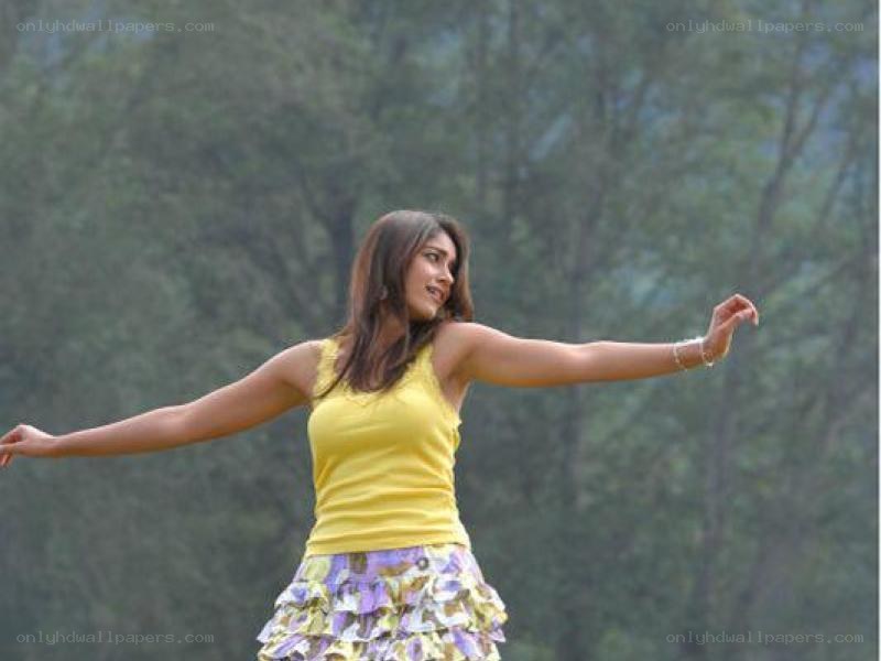 woman in yellow top dancing