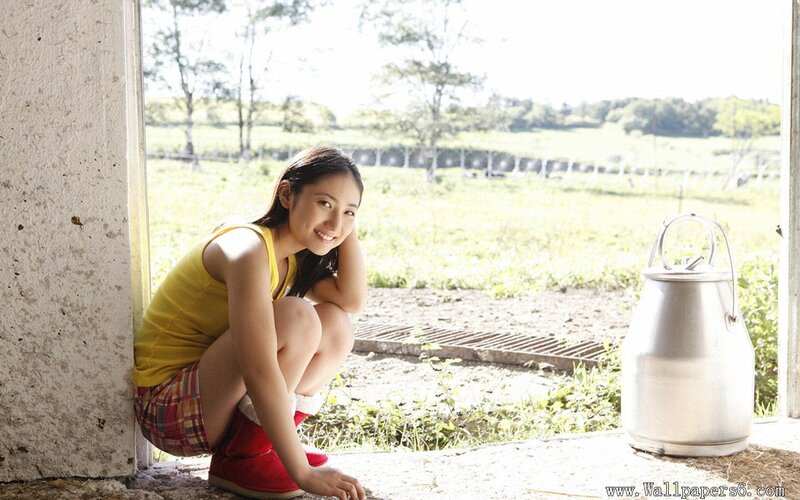 woman in yellow top on farm