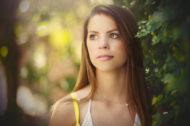 woman in yellow top outdoors