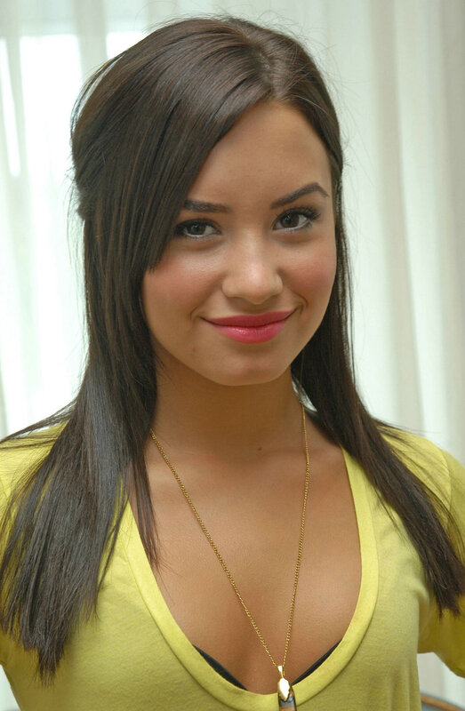 woman in yellow top smiling