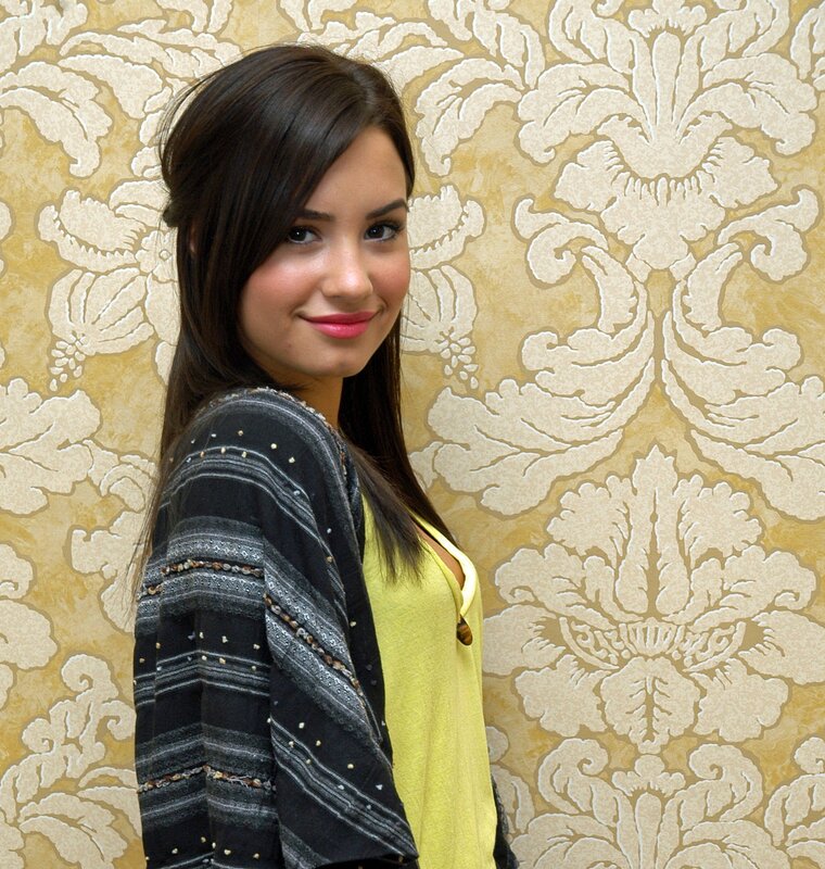 woman in yellow top smiling
