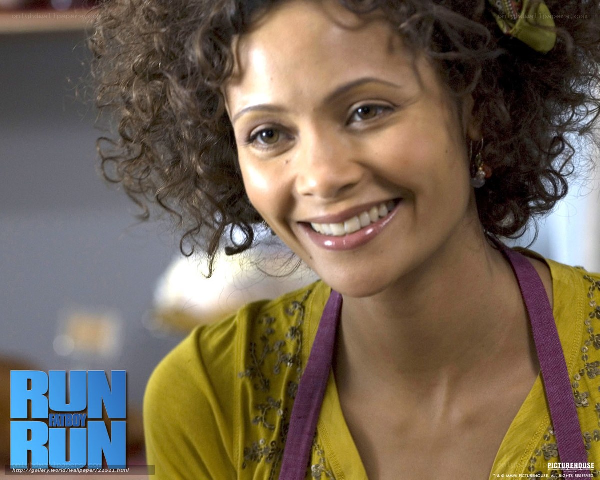woman in yellow top smiling