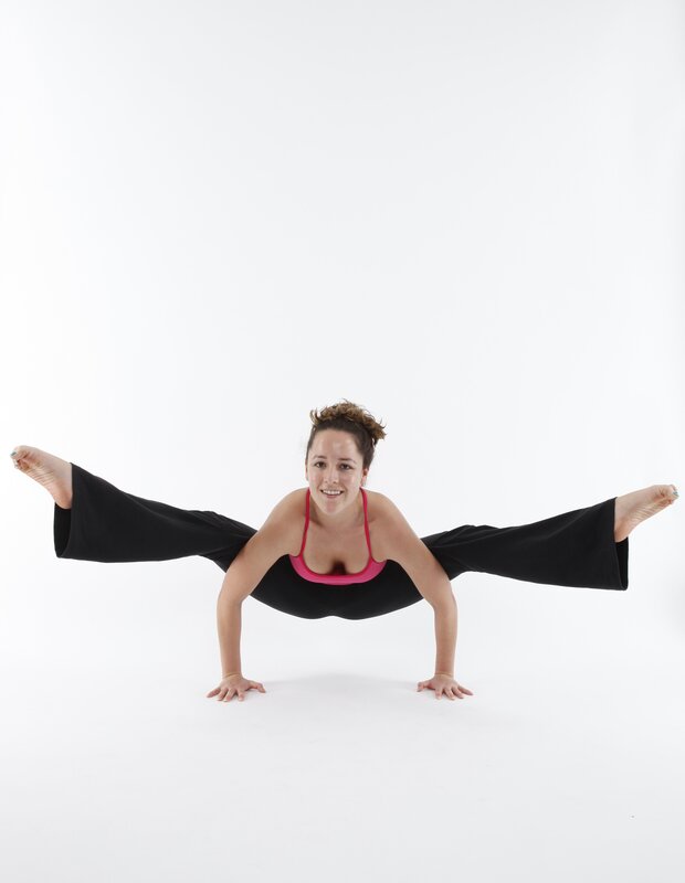 Woman in Yoga Pose — White, Focused, Photograph, Black Pants