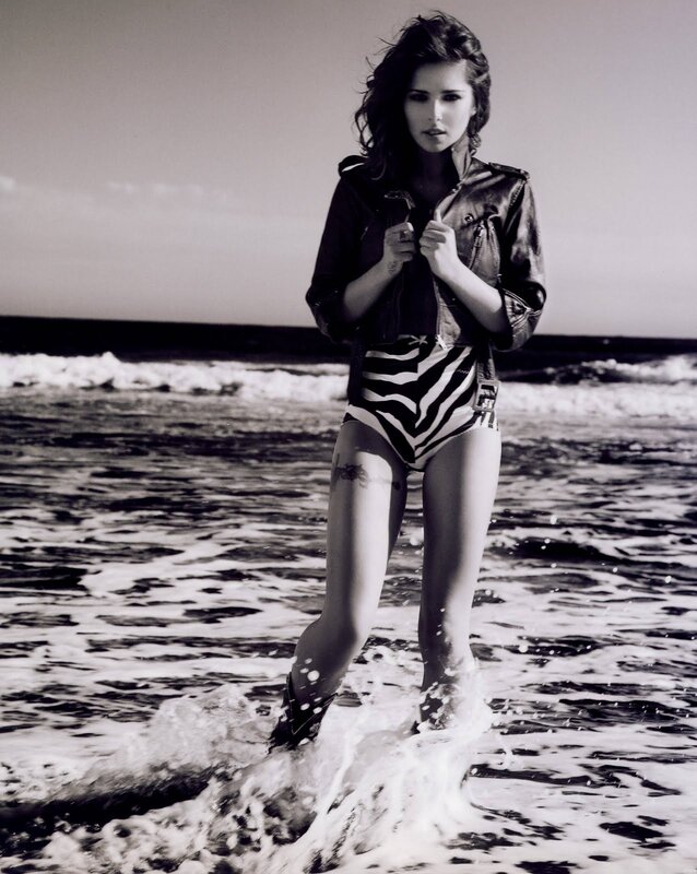 Woman in zebra swimsuit at beach