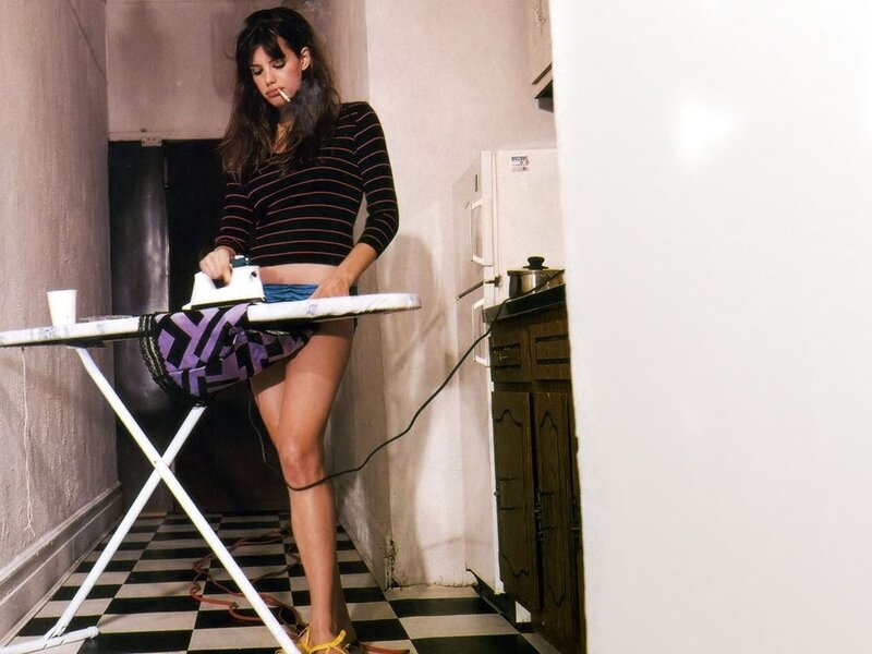 Woman Ironing Clothes