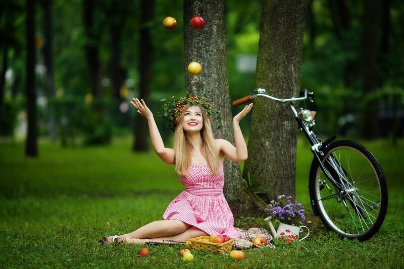 Woman Juggling Apples