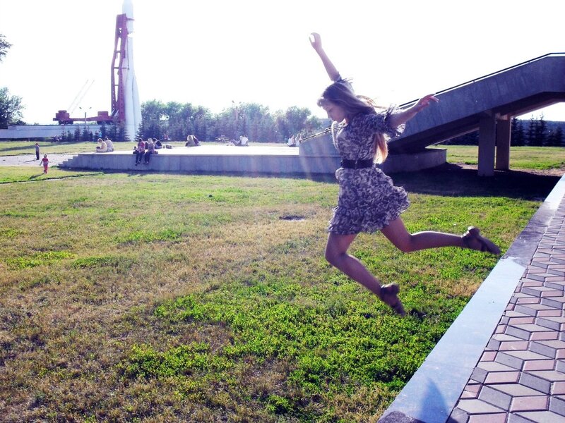 Woman jumping in a park
