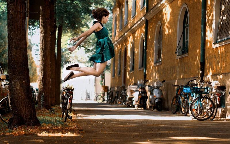 Woman Jumping in Air — Green