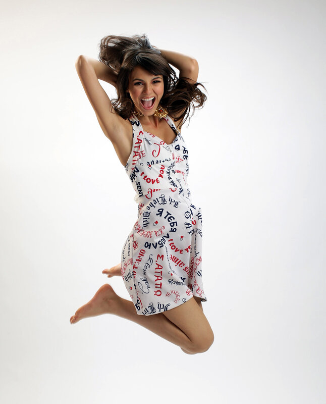woman jumping in dress