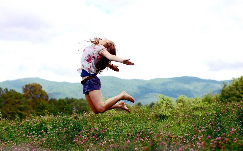 Woman Jumping in Field — Green, Joyful, Afternoon