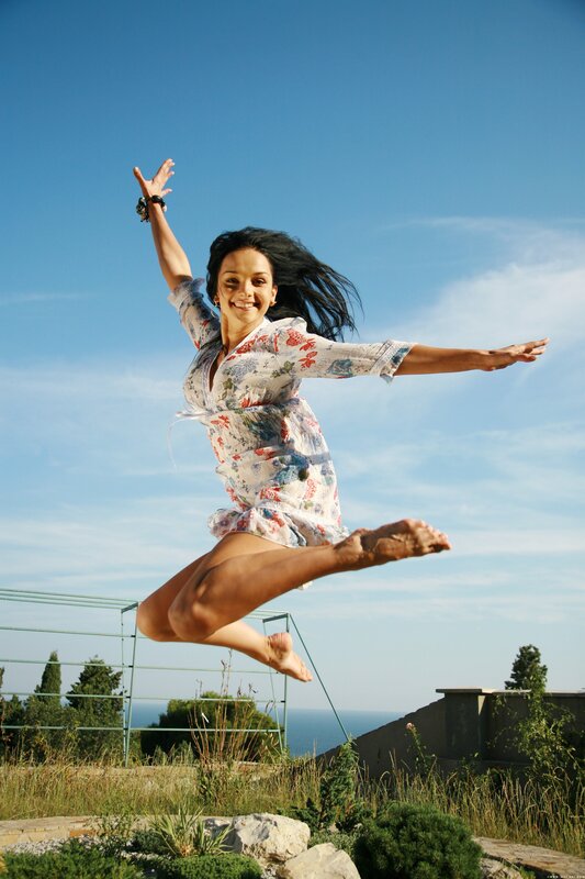 Woman jumping in joy