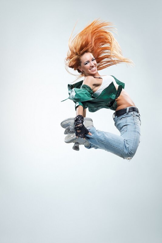 woman jumping in mid-air