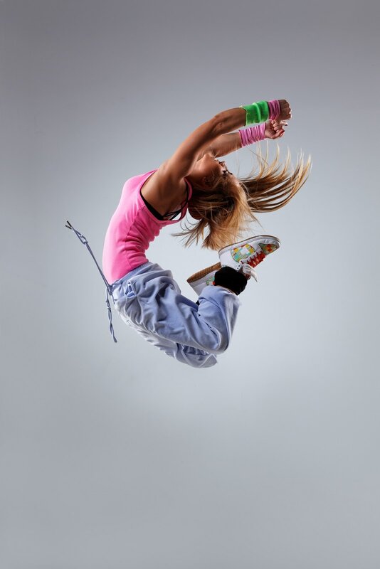 woman jumping in mid-air