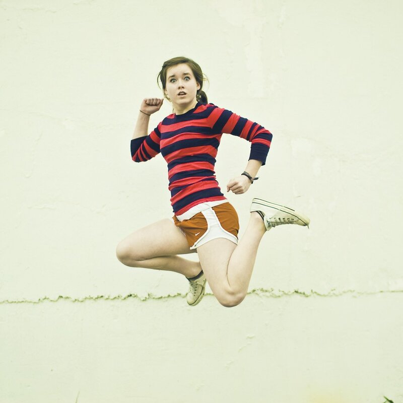 woman jumping in mid-air