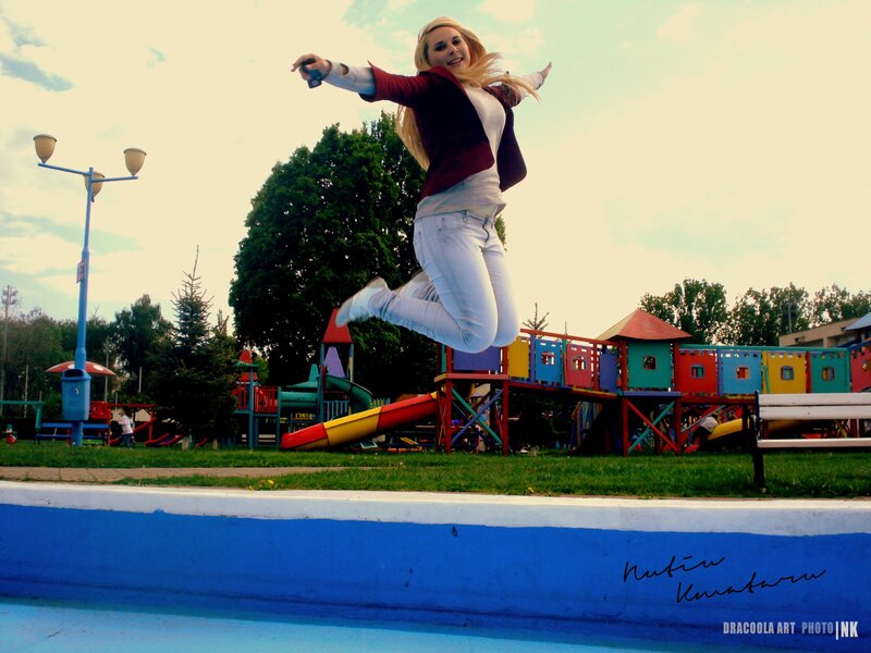 Woman Jumping in Park
