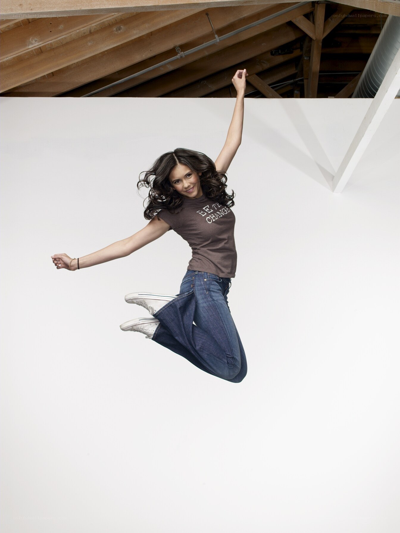 woman jumping in studio