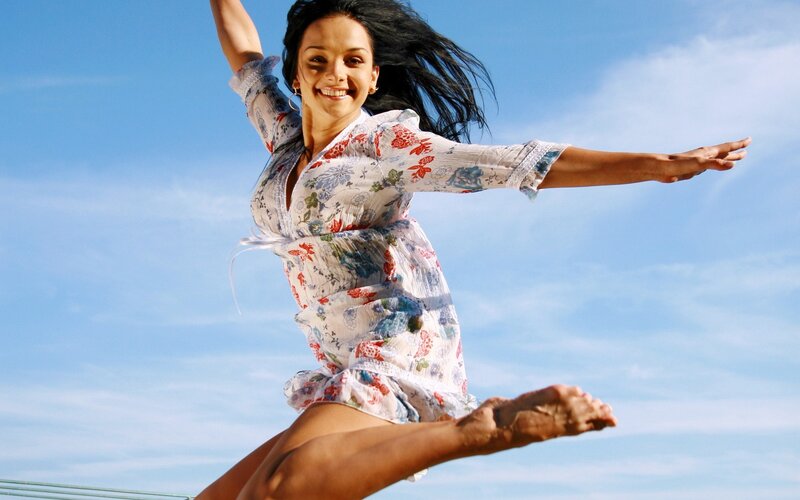 woman jumping in the air