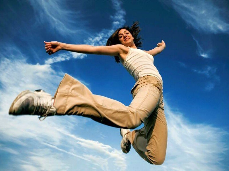 woman jumping in the air