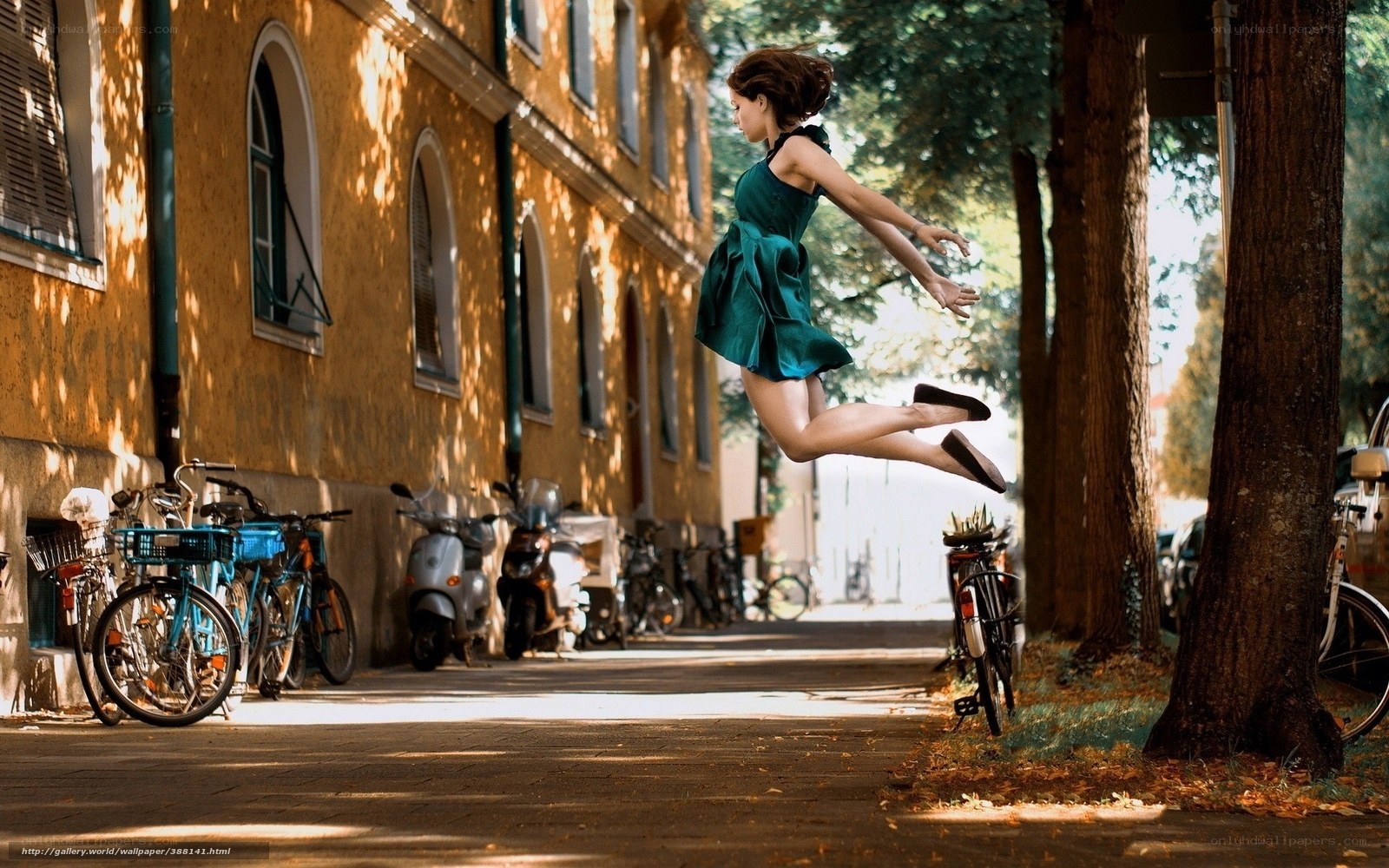 Woman jumping in the street