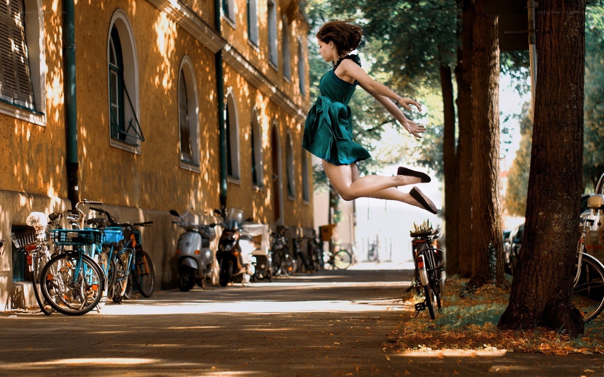 Woman jumping in the street