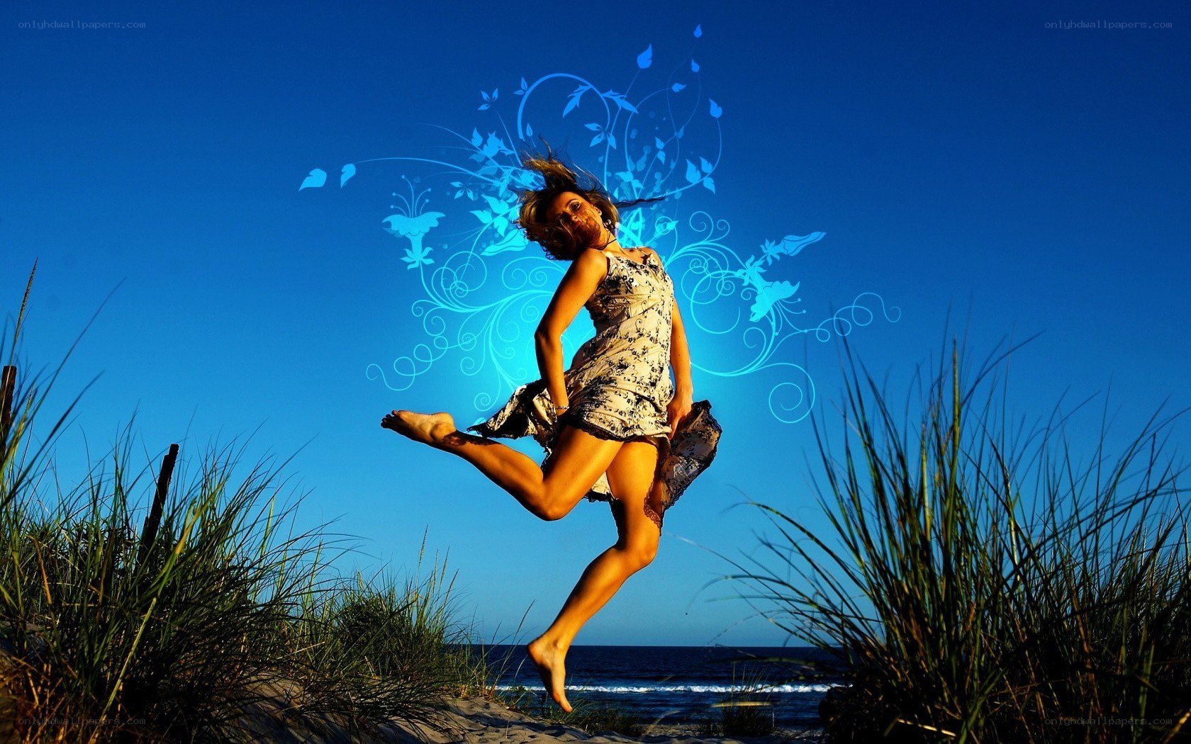 Woman jumping on a beach