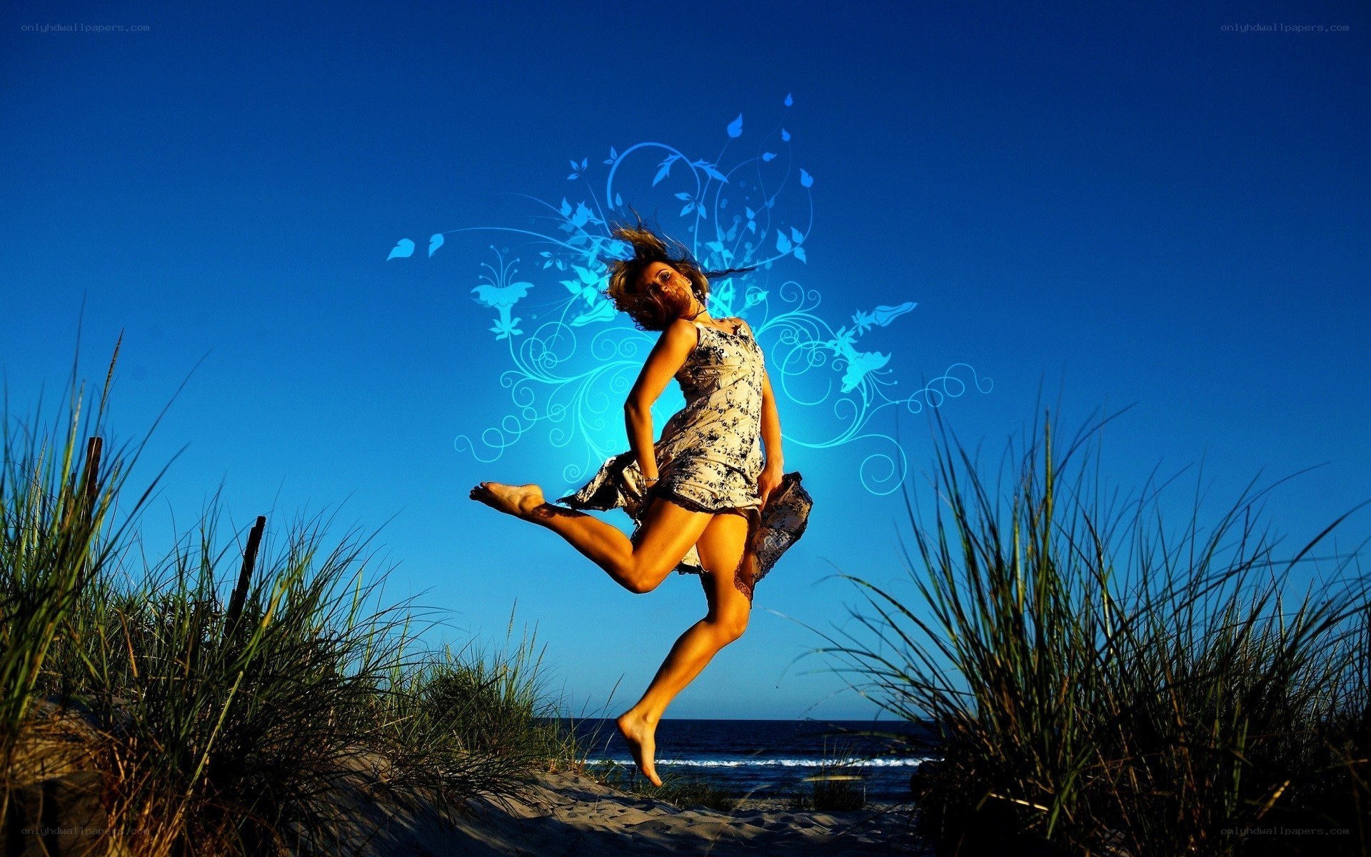 Woman jumping on beach