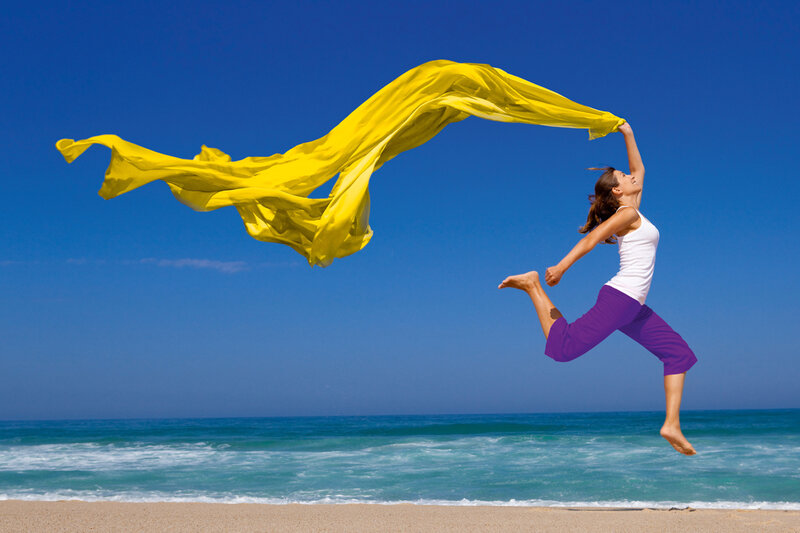 Woman Jumping on Beach — Blue, Energetic, Afternoon