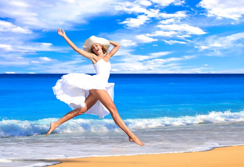 Woman Jumping on Beach — Blue, Joyful, Afternoon