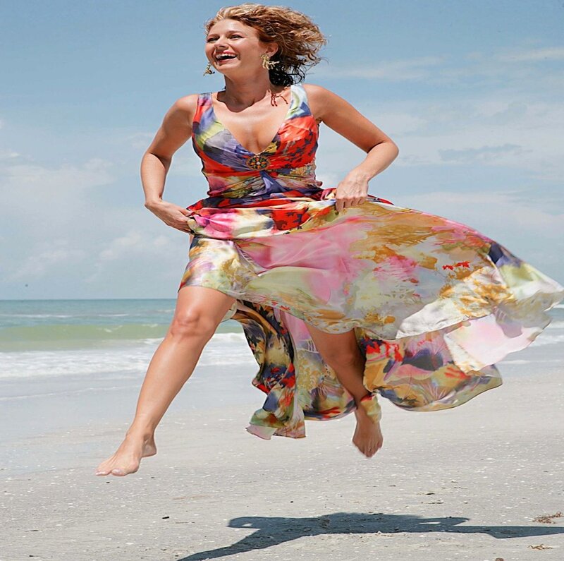 Woman Jumping on Beach — Blue, Joyful